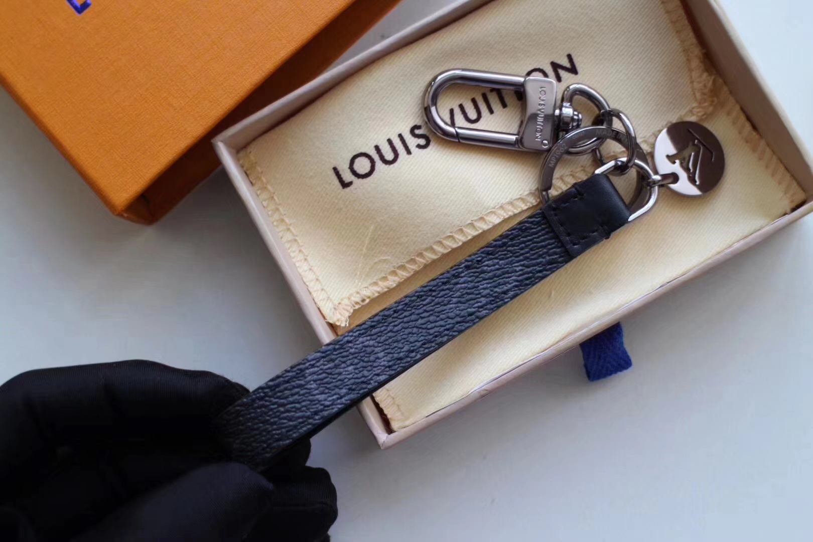 Shop Louis Vuitton Dragonne Bag Charm & Key Holder (BIJOU DE SAC ET  PORTE-CLES DRAGONNE, M61950, MONOGRAM ECLIPSE WRIST STRAP, BAG CHARM AND  KEY RING) by Mikrie