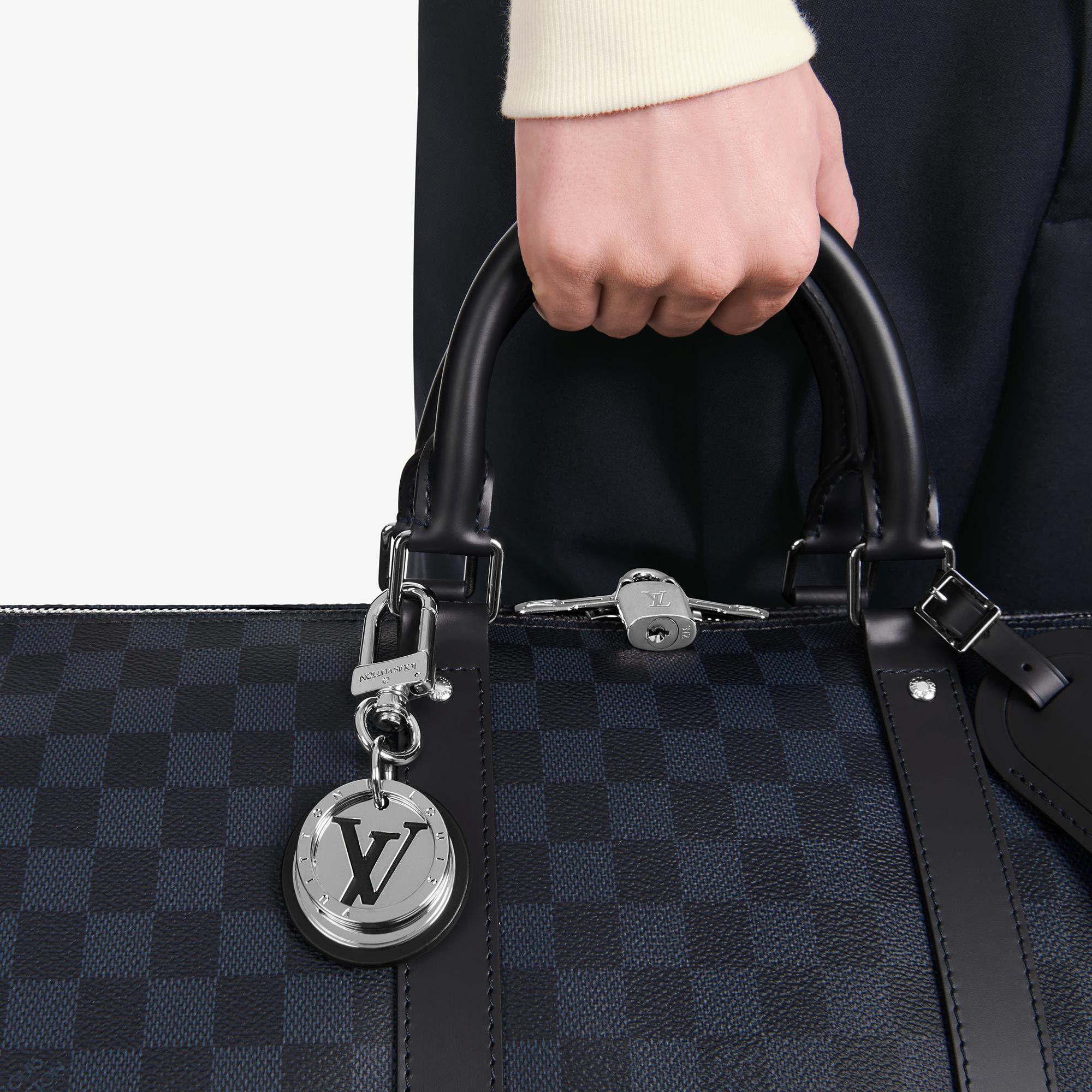 Louis Vuitton® Monogram Slim Dragonne Bag Charm And Key Holder
